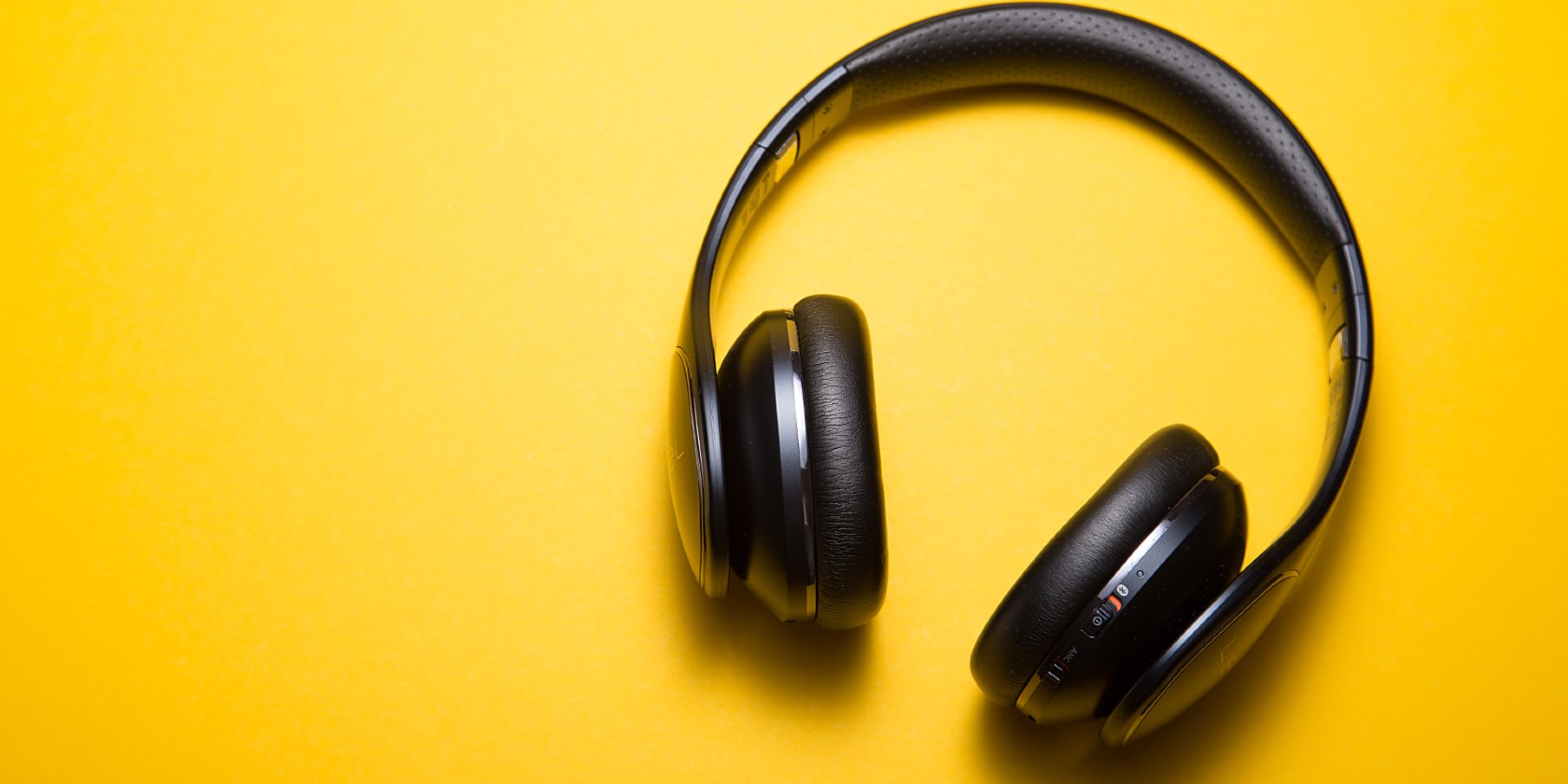 headphones on a yellow background